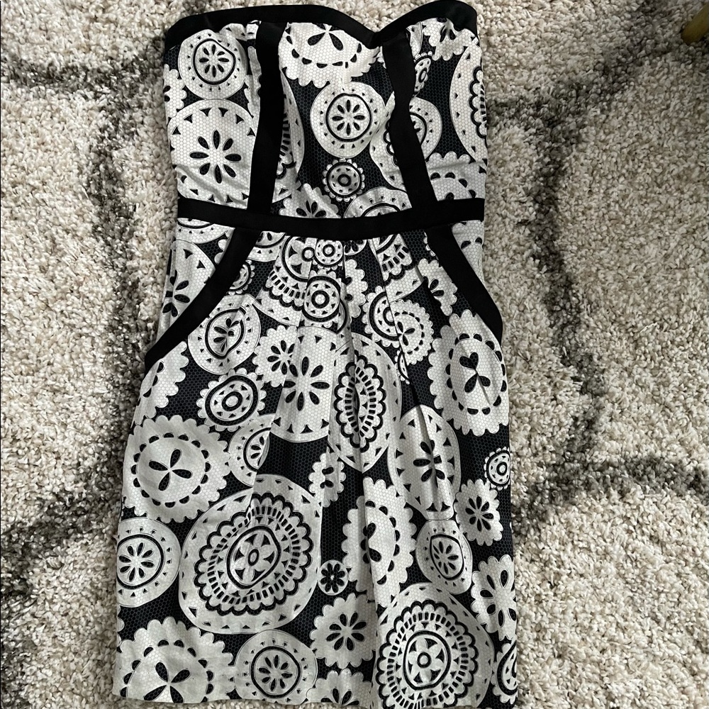 Black with white flowers strapless dress.